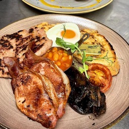 Breakfast plates with eggs and bacon