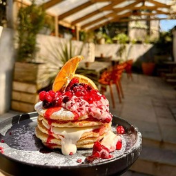 Berry-topped dessert on the terrace